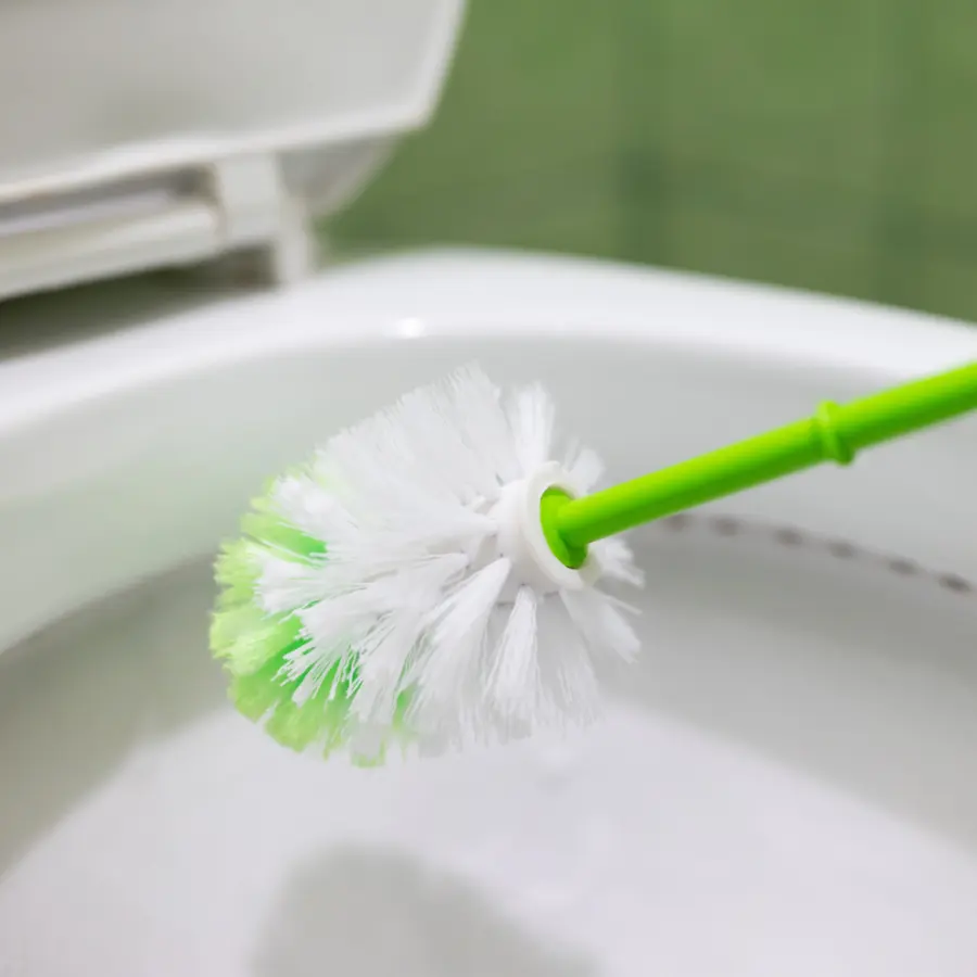 Sutton-in-Ashfield School Cleaning - Cleaning Toilet Rim with Toilet Brush | 360 Commercial Cleaning Ltd